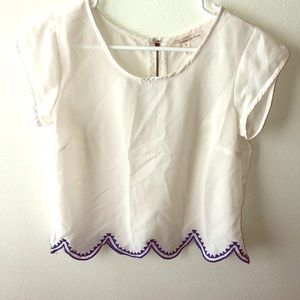 White with blue embellishment top.